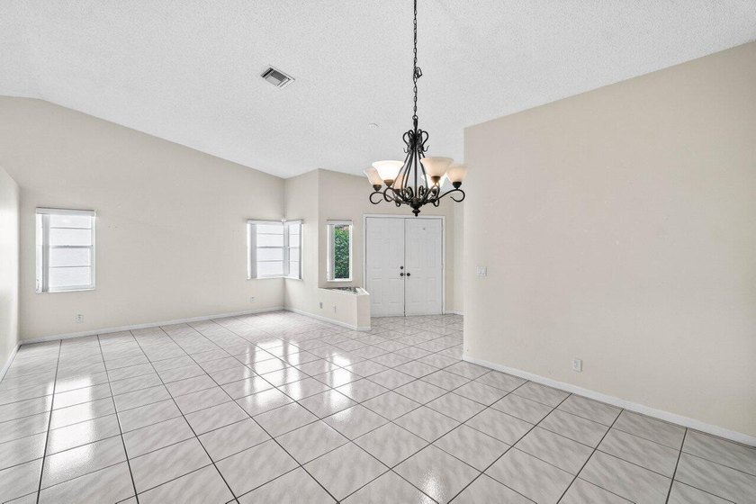 Nestled in the sought after Boca Springs neighborhood, this 3 - photo 4
