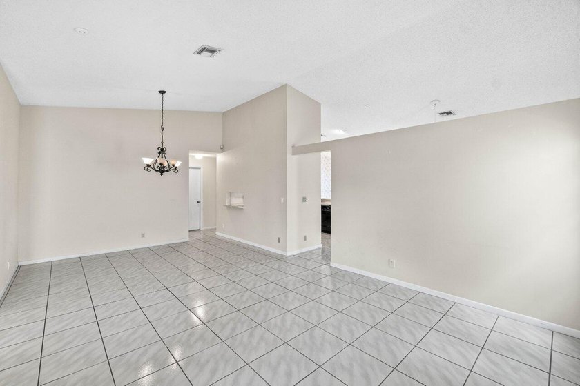 Nestled in the sought after Boca Springs neighborhood, this 3 - photo 5