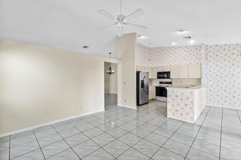 Nestled in the sought after Boca Springs neighborhood, this 3 - photo 6