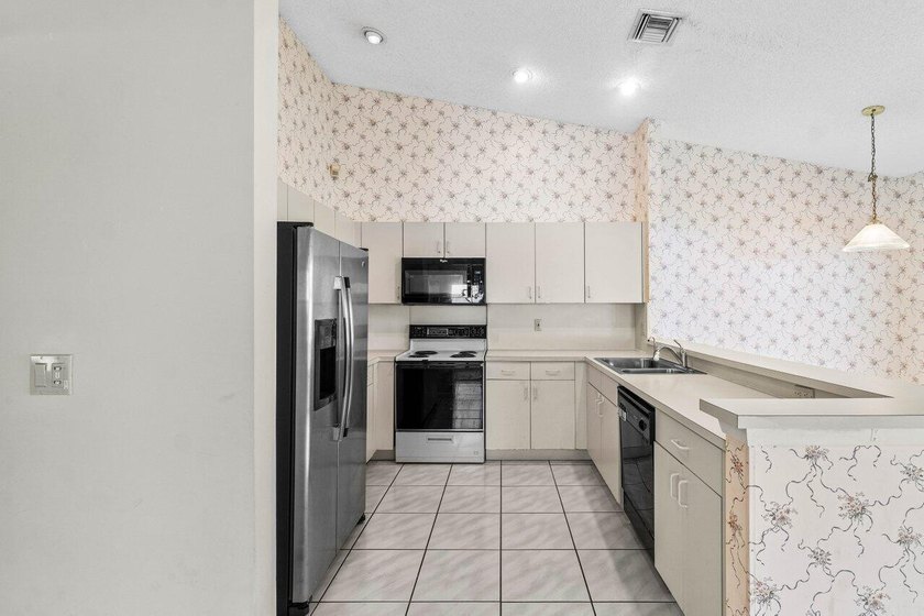 Nestled in the sought after Boca Springs neighborhood, this 3 - photo 8