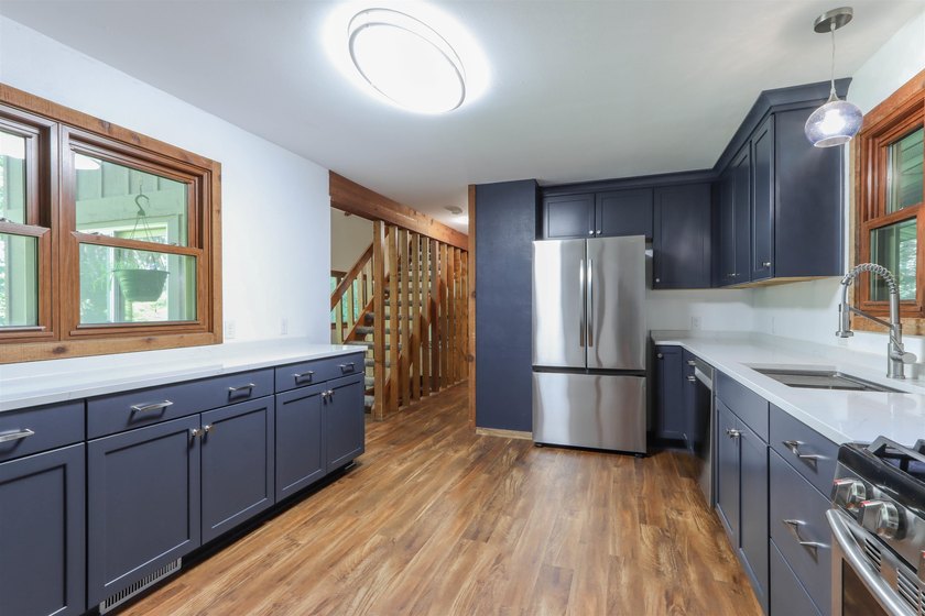 Nestled on two wooded lots just south of Waupaca, this 3BR, 2BA - photo 10