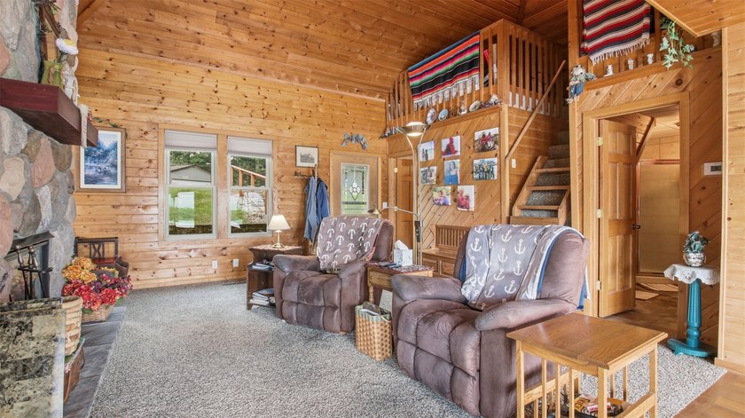 Enjoy front-row lake living on the Chetek Chain at this inviting - photo 17