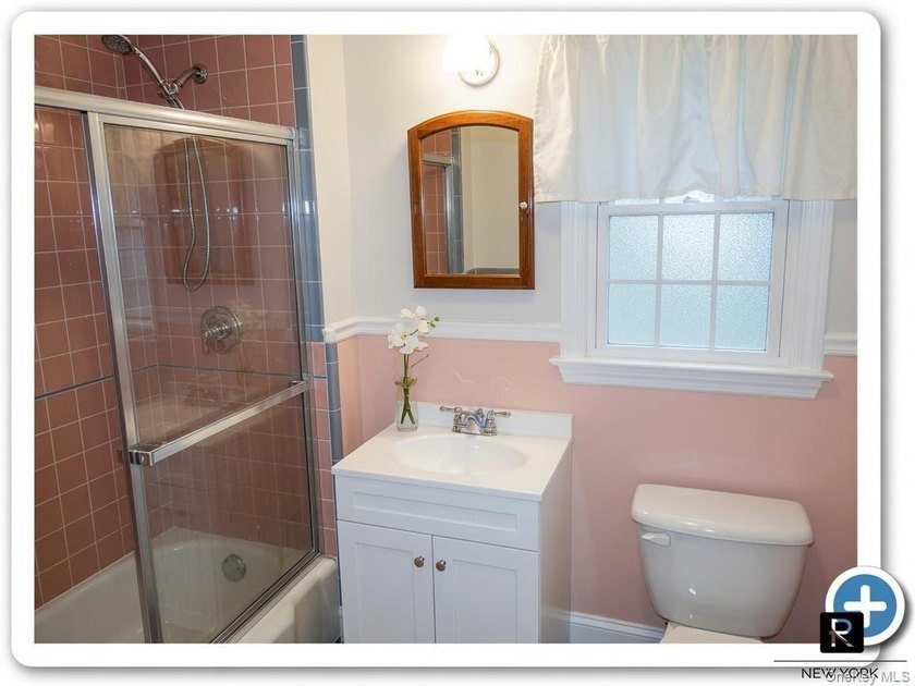 This well-maintained brick two-family home offers an exceptional - photo 8