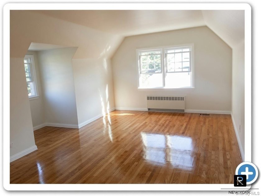 This well-maintained brick two-family home offers an exceptional - photo 10
