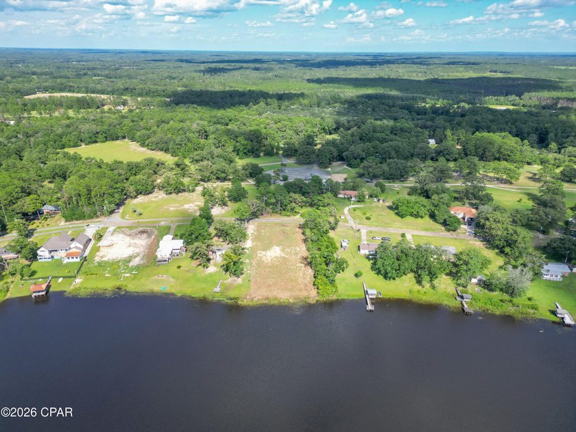 Desirable waterfront lot located on the larger lake in the - photo 11