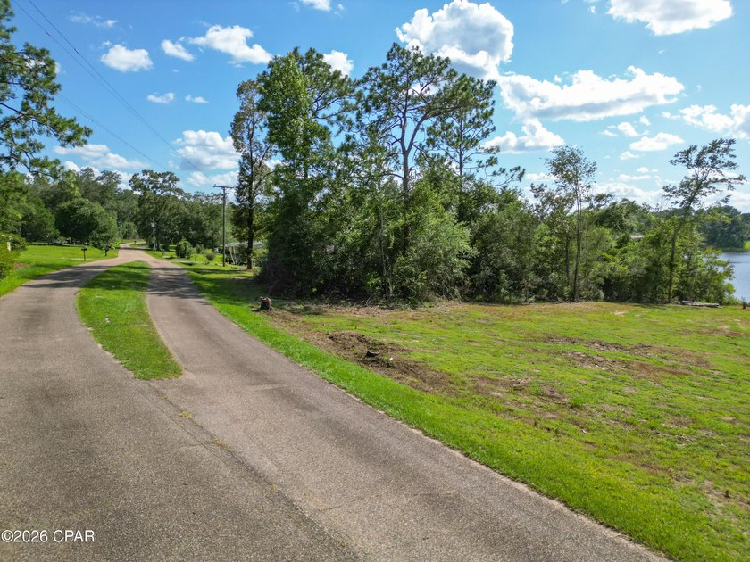 Desirable waterfront lot located on the larger lake in the - photo 13