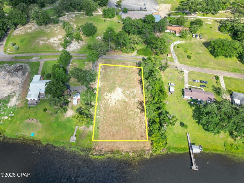 Desirable waterfront lot located on the larger lake in the - photo 17