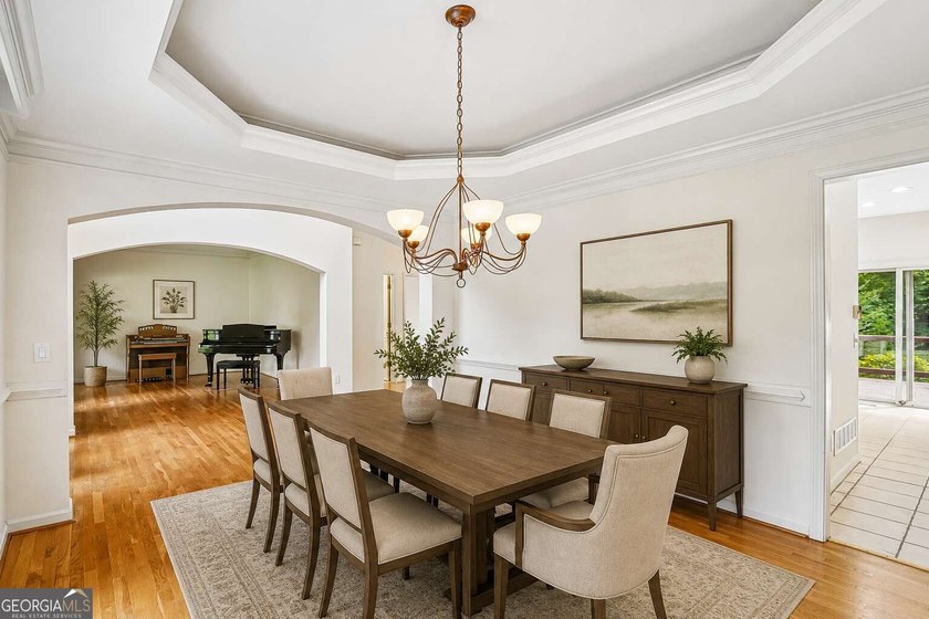 Nestled on a quiet cul-de-sac lot backing to acres of private - photo 12