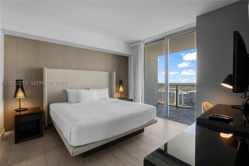 Beach-inspired, high-rise turnkey residence offering a new - photo 12