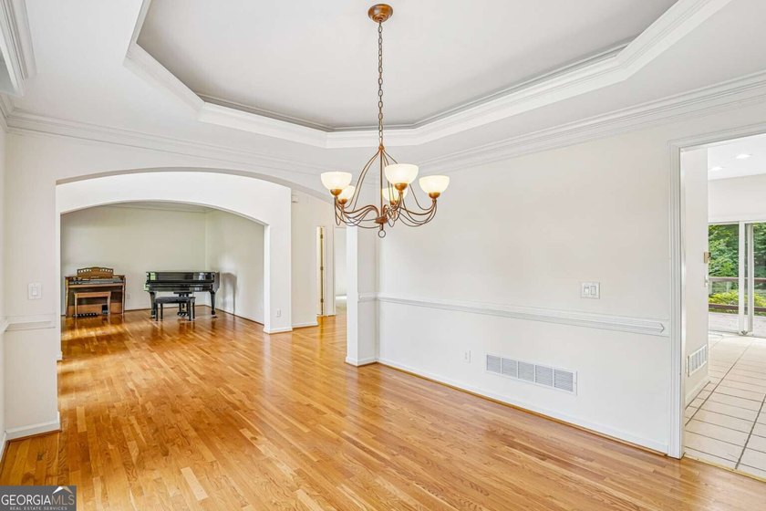 Nestled on a quiet cul-de-sac lot backing to acres of private - photo 13