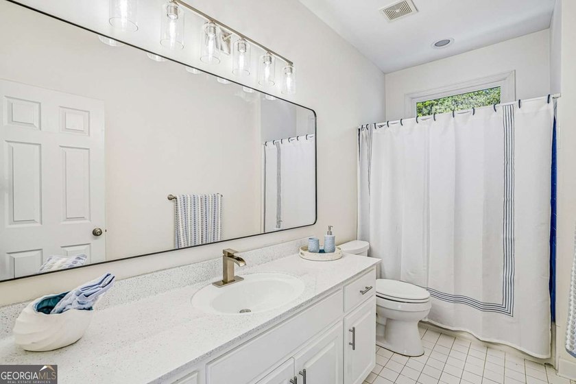 Nestled on a quiet cul-de-sac lot backing to acres of private - photo 15