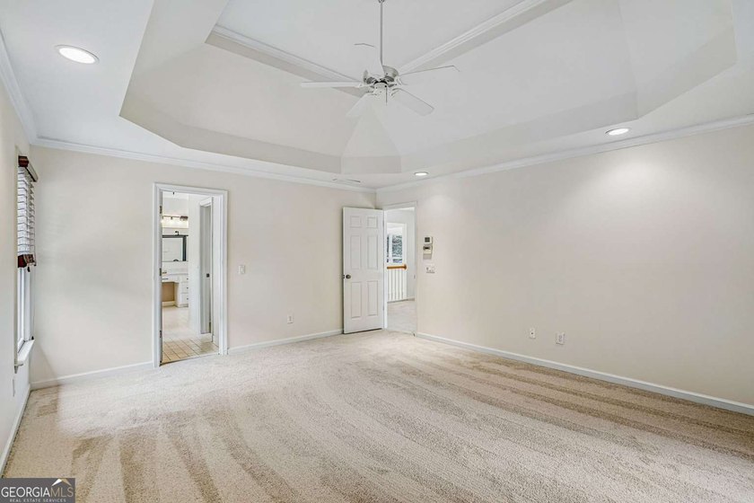 Nestled on a quiet cul-de-sac lot backing to acres of private - photo 18