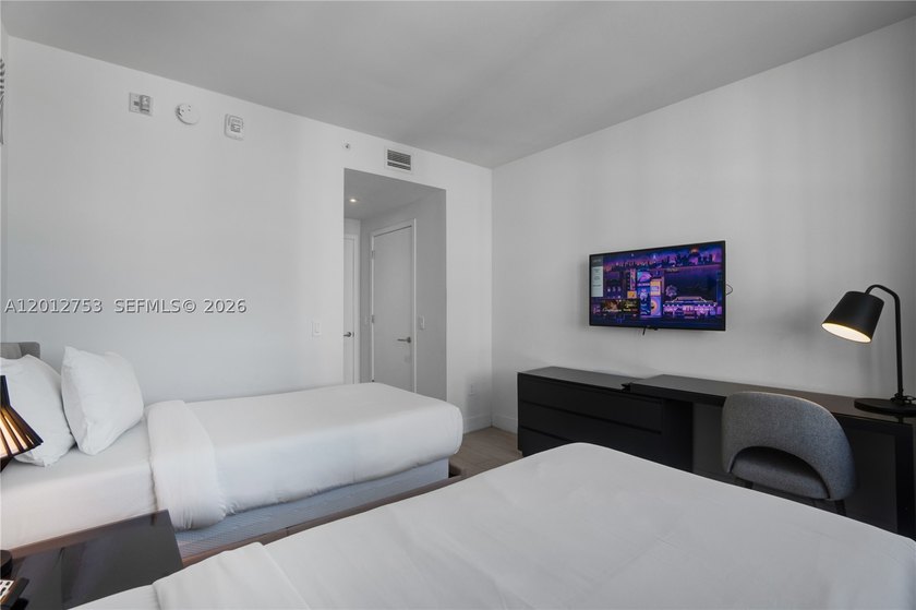 Beach-inspired, high-rise turnkey residence offering a new - photo 18
