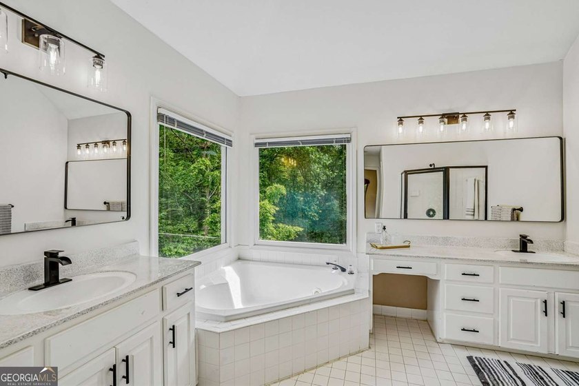 Nestled on a quiet cul-de-sac lot backing to acres of private - photo 19