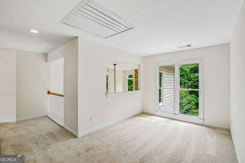 Nestled on a quiet cul-de-sac lot backing to acres of private - photo 21