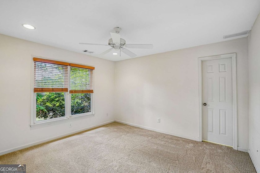 Nestled on a quiet cul-de-sac lot backing to acres of private - photo 26