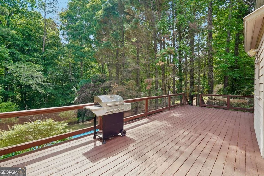 Nestled on a quiet cul-de-sac lot backing to acres of private - photo 36
