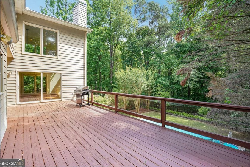 Nestled on a quiet cul-de-sac lot backing to acres of private - photo 37