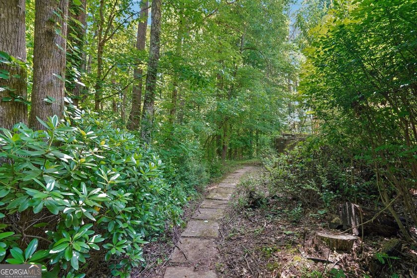 Nestled on a quiet cul-de-sac lot backing to acres of private - photo 45