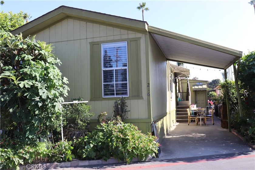 SUPER NICE HOME IN A FAMILY PARK! NESTLED INSIDE THIS SMALL - photo 3