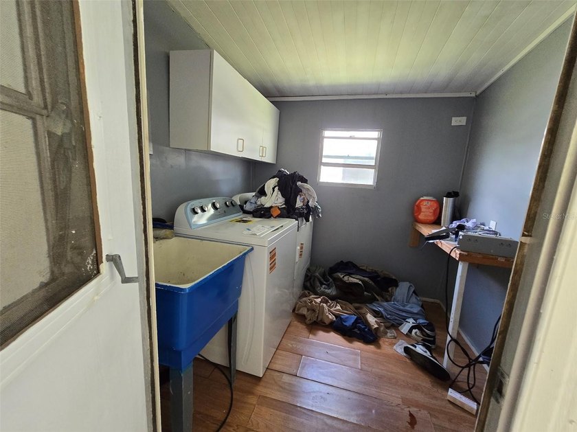 This manufactured home sits on owned land in The Villages. No - photo 8