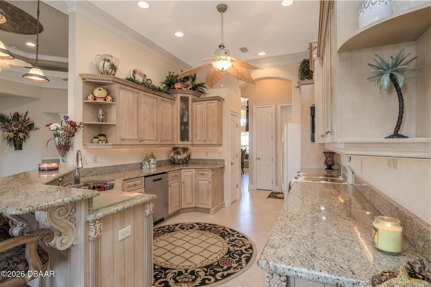Nestled within the prestigious enclave of Ormond Lakes, this - photo 11