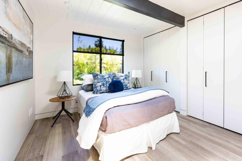 Completely renovated, this exceptional home blends iconic design - photo 15