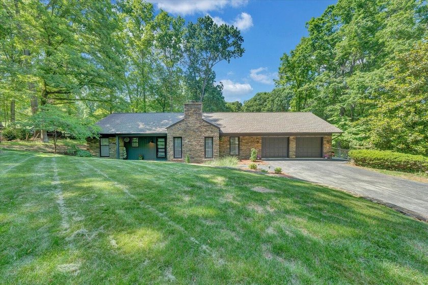 Welcome to this beautifully updated ranch home located in the - photo 3
