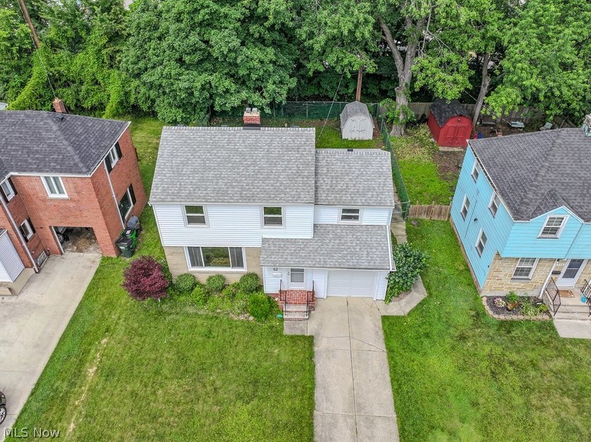 Welcome to 180 E. 264th Street, a beautifully updated 3-bedroom - photo 2