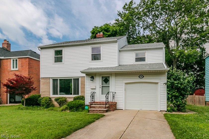 Welcome to 180 E. 264th Street, a beautifully updated 3-bedroom - photo 3