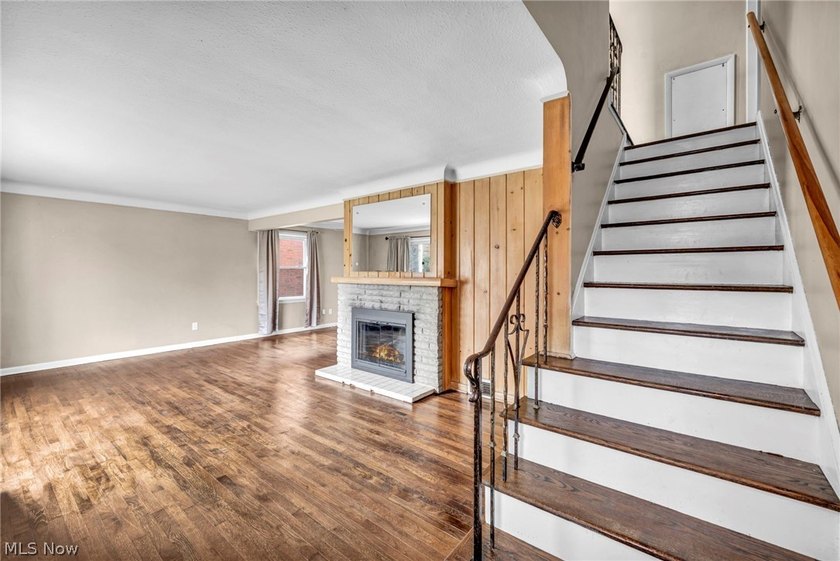 Welcome to 180 E. 264th Street, a beautifully updated 3-bedroom - photo 4