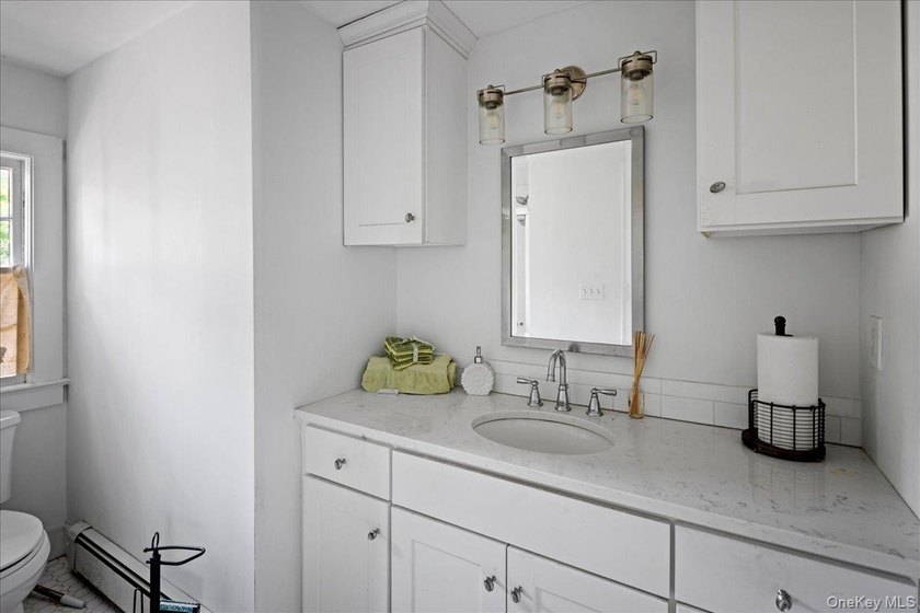 Welcome to 38 Landing Meadow Road, Smithtown. Nestled on almost - photo 22
