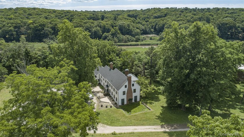 Welcome to 38 Landing Meadow Road, Smithtown. Nestled on almost - photo 36