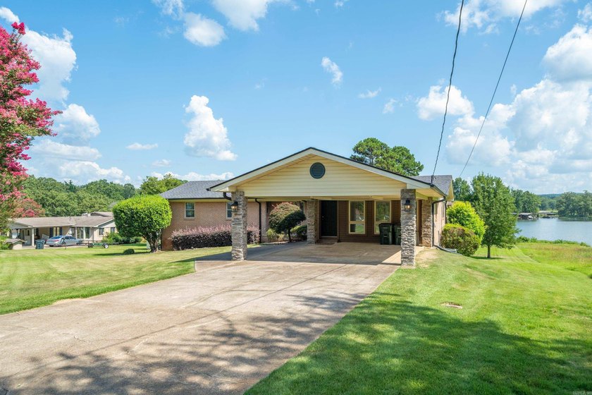 Experience the best of lake living with this beautifully updated - photo 3