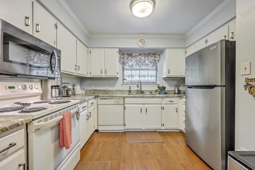 Light, bright, and inviting throughout, this thoughtfully - photo 6