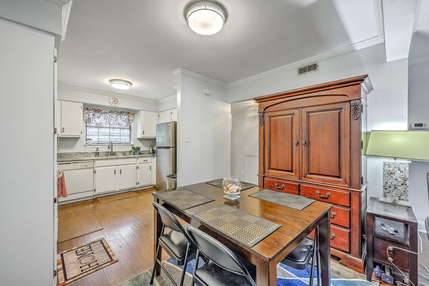 Light, bright, and inviting throughout, this thoughtfully - photo 8