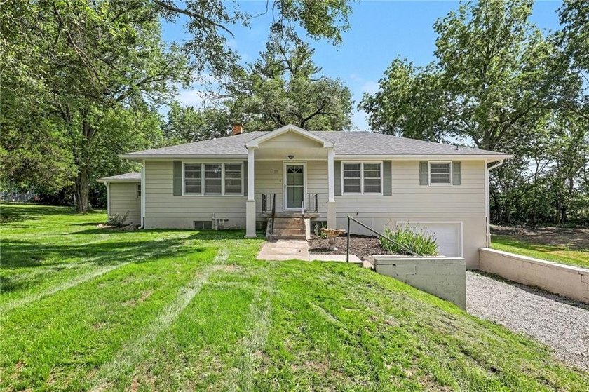 Completely renovated and move-in ready, this charming raised - photo 3