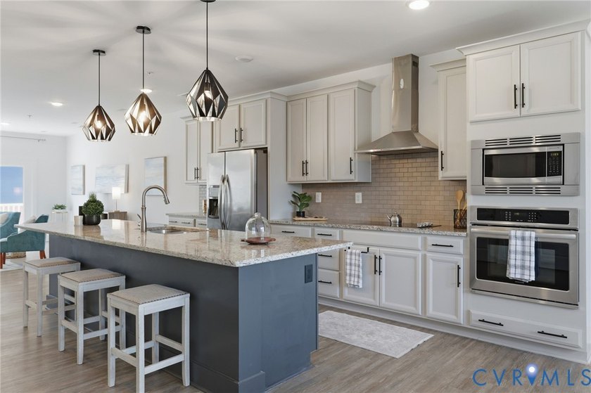 This beautifully designed two-story townhome style condo with a - photo 12