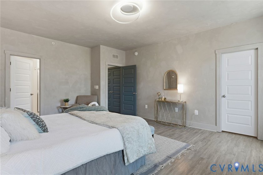 This beautifully designed two-story townhome style condo with a - photo 18
