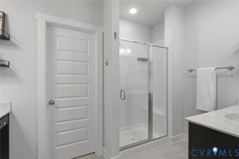 This beautifully designed two-story townhome style condo with a - photo 19