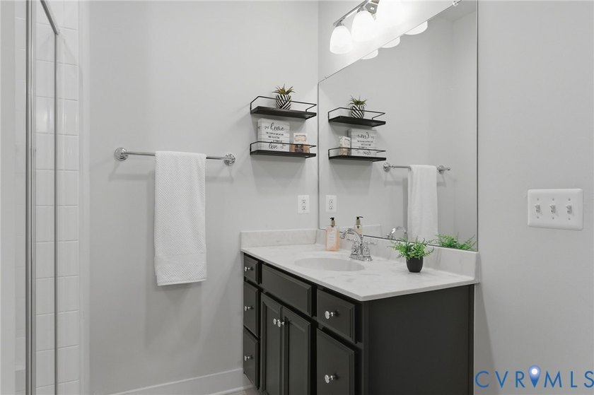 This beautifully designed two-story townhome style condo with a - photo 20