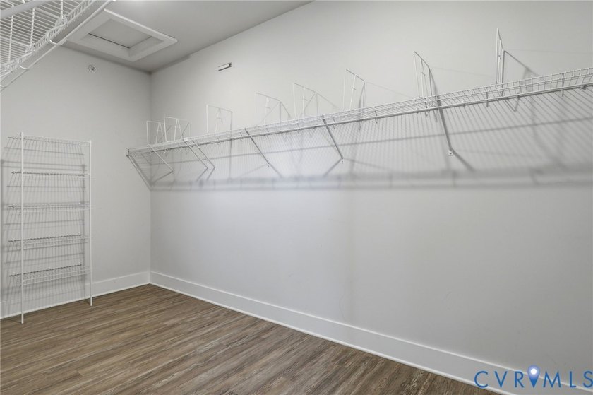 This beautifully designed two-story townhome style condo with a - photo 22