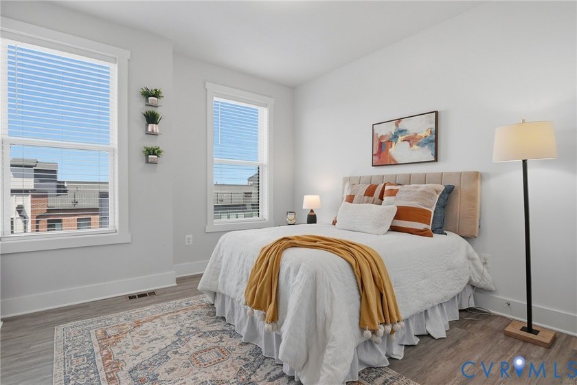 This beautifully designed two-story townhome style condo with a - photo 23