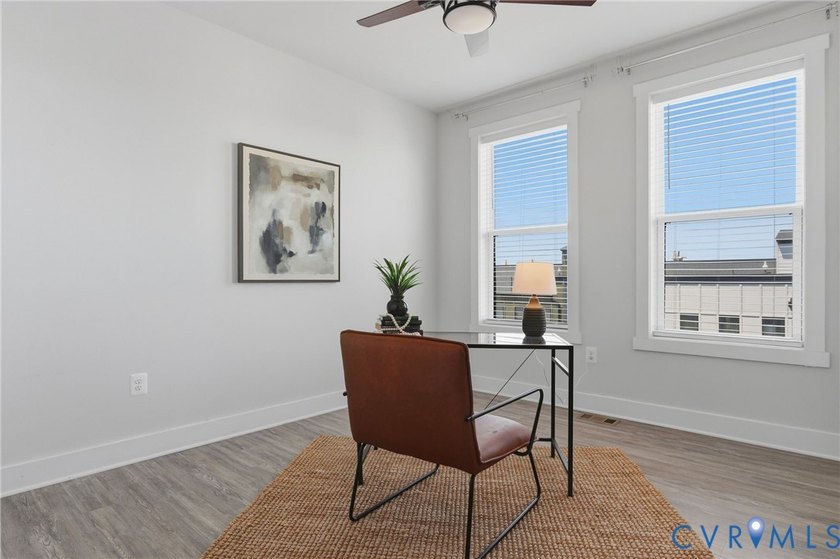 This beautifully designed two-story townhome style condo with a - photo 24