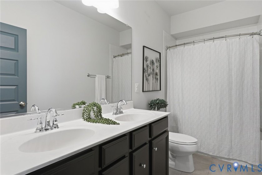 This beautifully designed two-story townhome style condo with a - photo 25