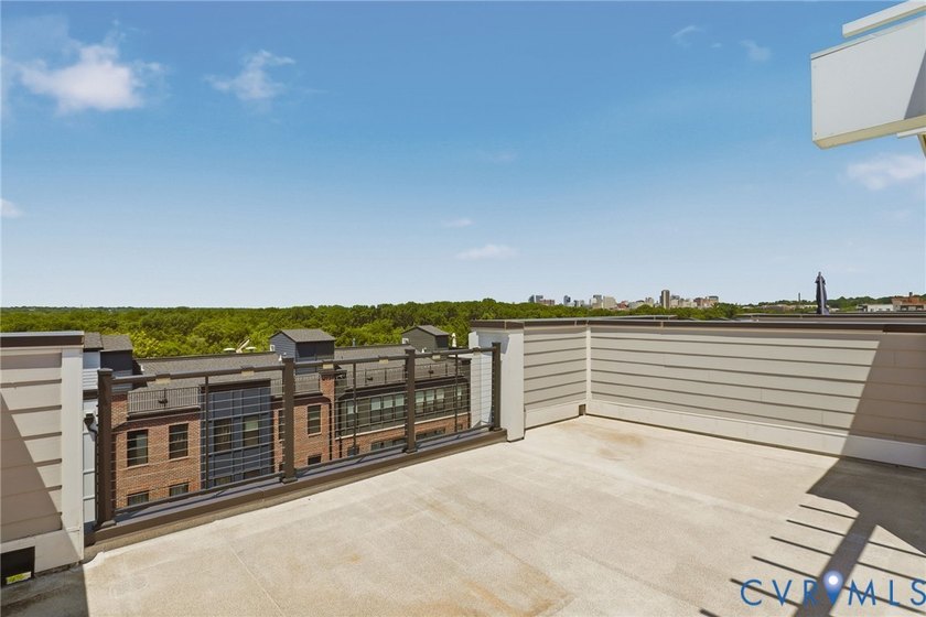 This beautifully designed two-story townhome style condo with a - photo 29