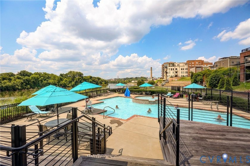 This beautifully designed two-story townhome style condo with a - photo 31