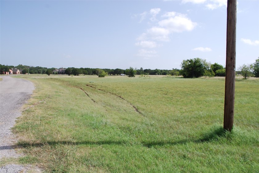 Large corner lot. Over half an acre in the front section of - photo 2