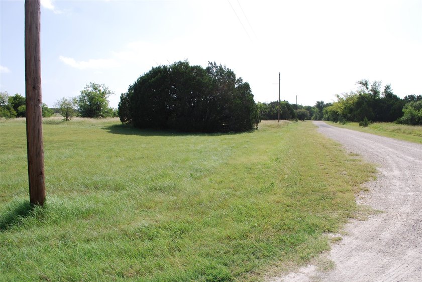 Large corner lot. Over half an acre in the front section of - photo 4