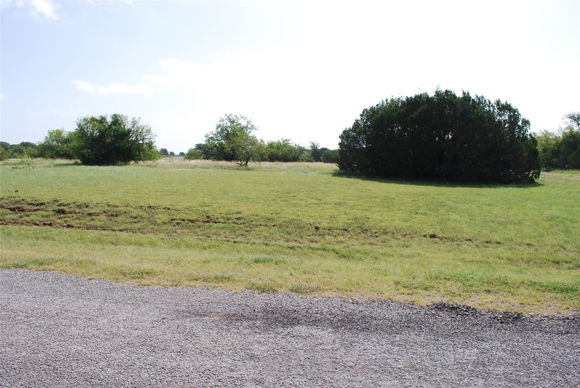 Large corner lot. Over half an acre in the front section of - photo 6